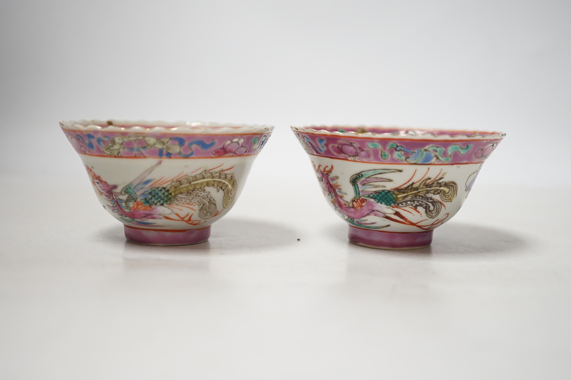 A pair of Chinese Straits famille rose pink ground bowls, Nonya ware, late 19th century, 5.5cm high